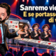 L’avatar di Gianluigi Bonanomi presenta una catena di montaggio di cantanti e un robot musicista: provocazione su Sanremo e varietà creativa.